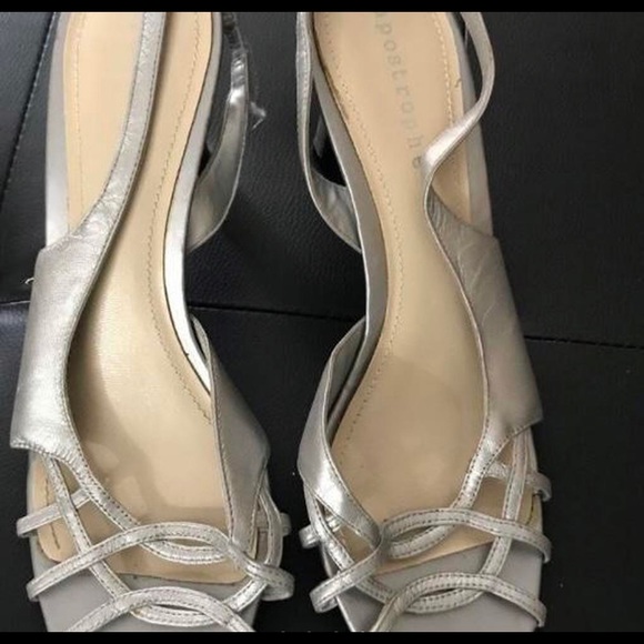 Silver open toe strapped heels. Size 9.5 medium
Lightly used - Like new - Picture 2 of 4
